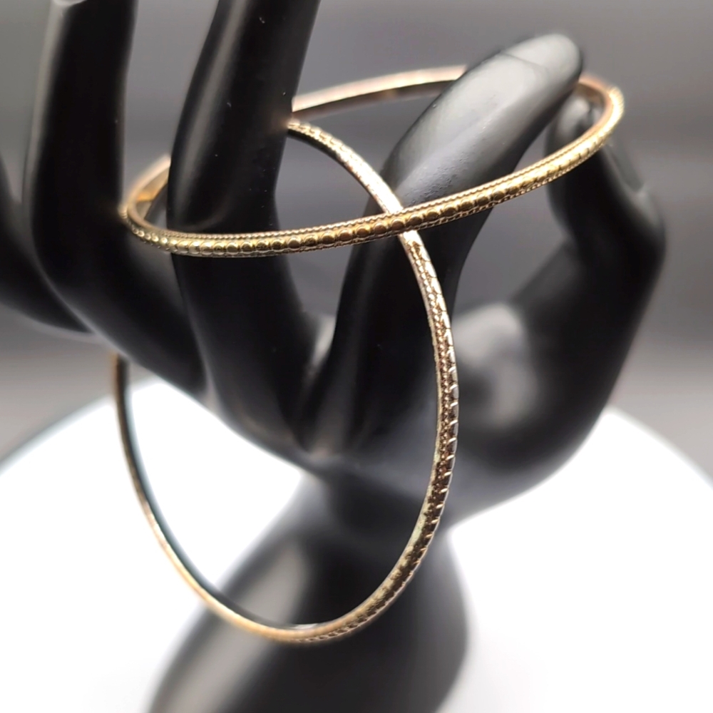 💵2/$10Bundle and Save💵2 Gold Toned Textured Bangle Jingle Bracelets